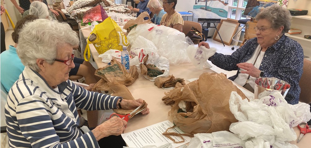 Residents creating sleeping mats