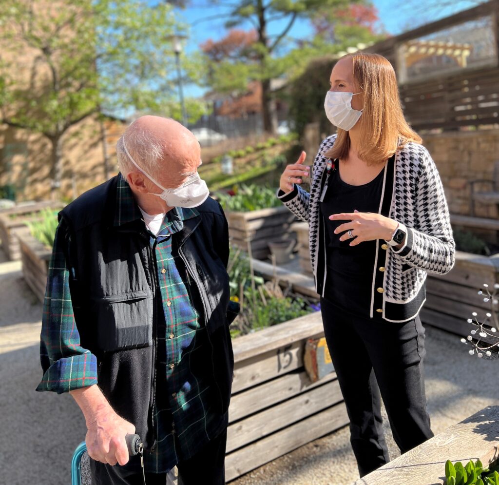 People outside in masks