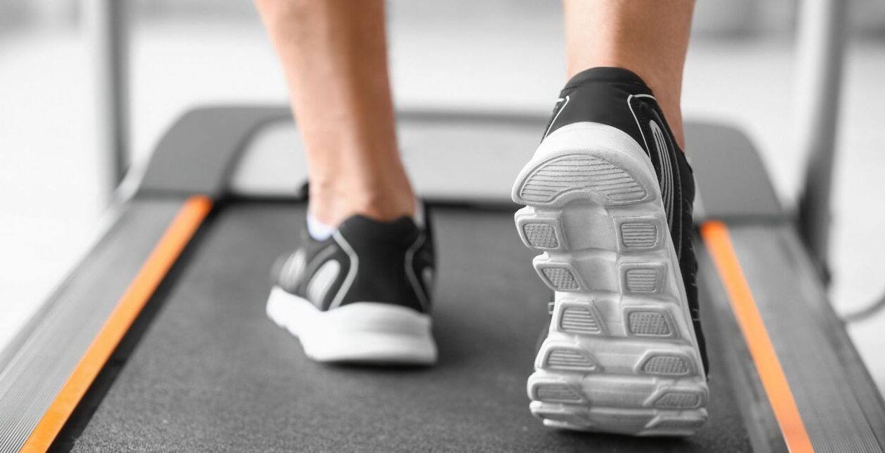close up of shoes and treadmill