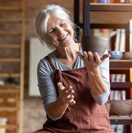 Woman working clay